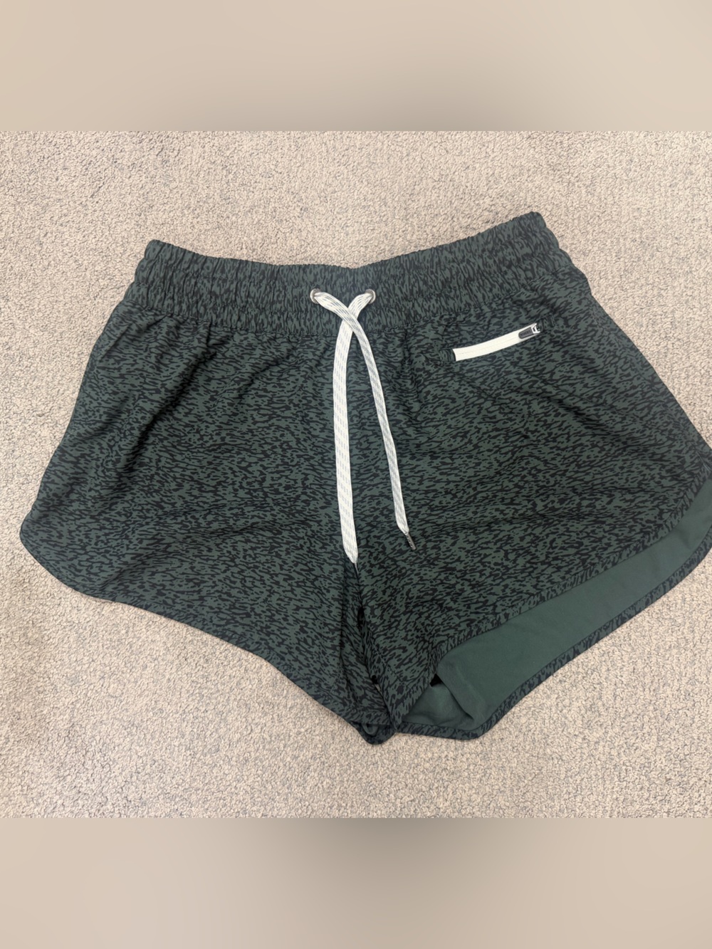 Vuori Women's Dark Green Heather Athletic Shorts with White Drawstring